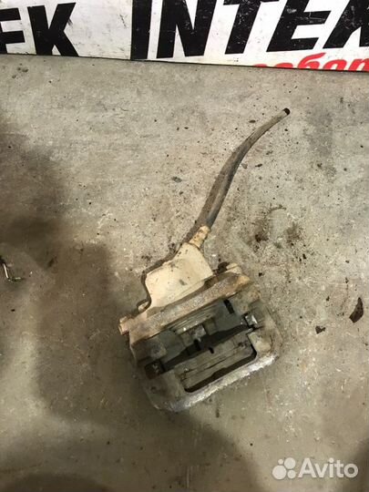 Суппорт передний правый Renault Logan