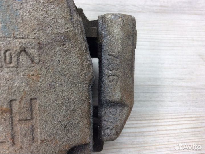 Суппорт тормозной передний левый Ford Focus 2