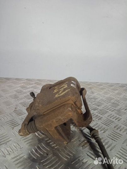 Суппорт передний левый Nissan X-Trail T31 2.0