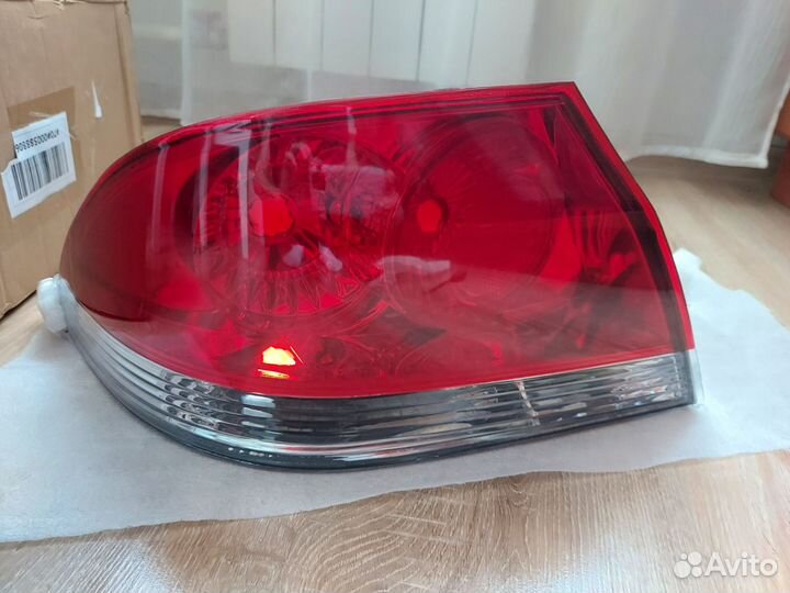 Фонарь левый новый неоргинал Mitsubishi Lancer IX