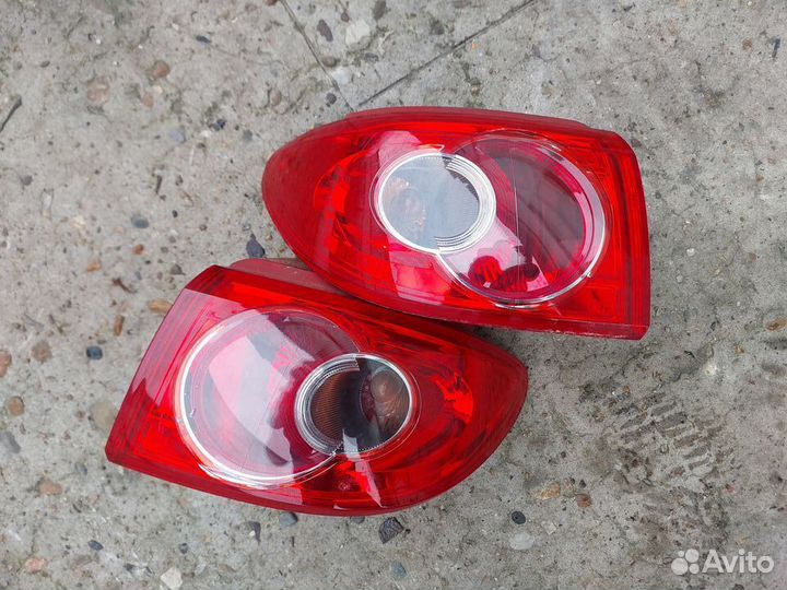 Фонарь,стоп мазда демио