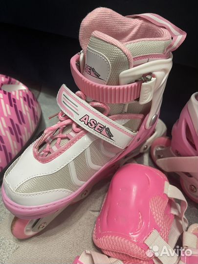 Роликовые коньки