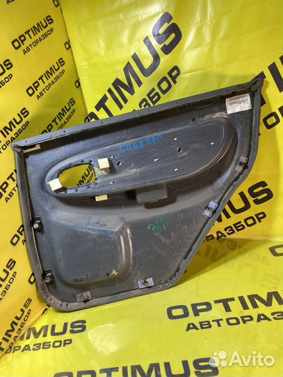 Обшивка задней левой двери Kia Spectra