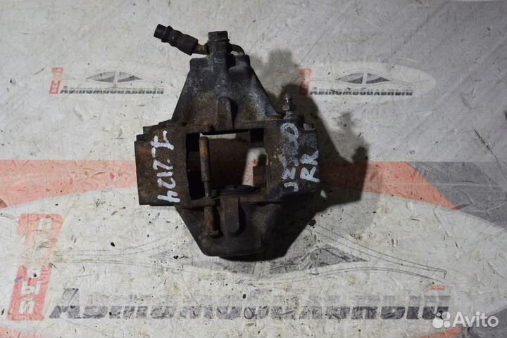 Суппорт зад право c Toyota Aristo JZS160 2JZ-GE