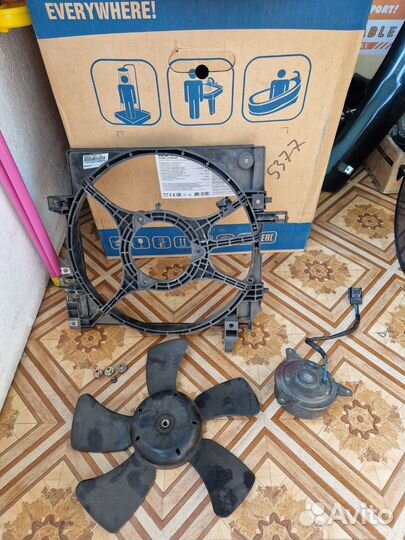 Дифузор вентилятора левый.Субару форестер SF5