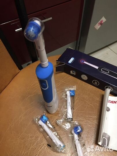 Электрическая зубная щётка