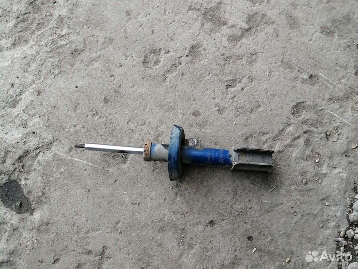 Стойка амортизатор opel astra G левый