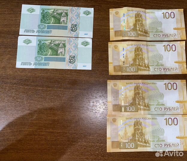 Банкнота номиналом 100 и 5