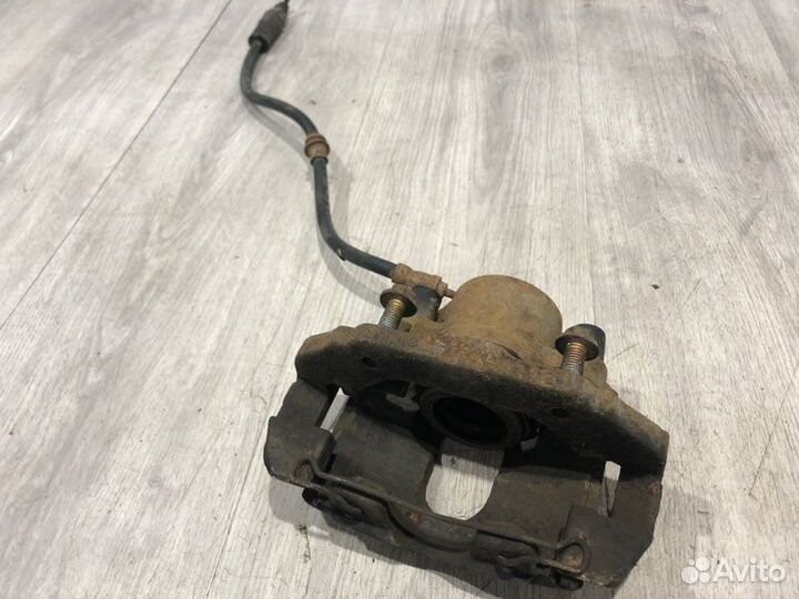 Суппорт тормозной передний левый Ford Fiesta MK5