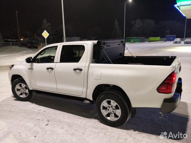 Жёсткая складная крышка Toyota Hilux 2015+2023