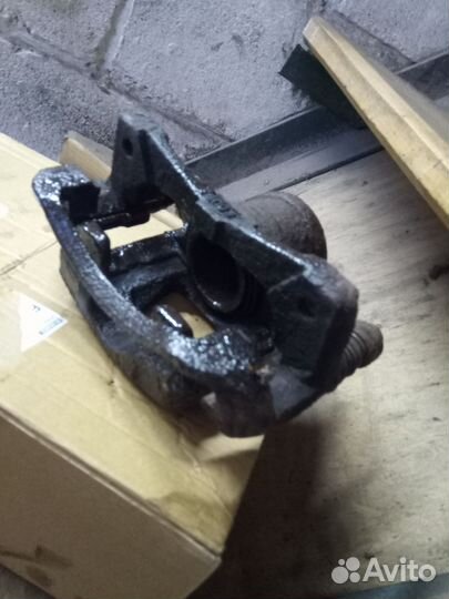 Передний левый тормозной суппорт Шевроле Авео