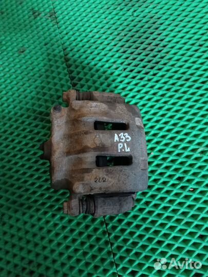 Суппорт передний левый Nissan Maxima A33