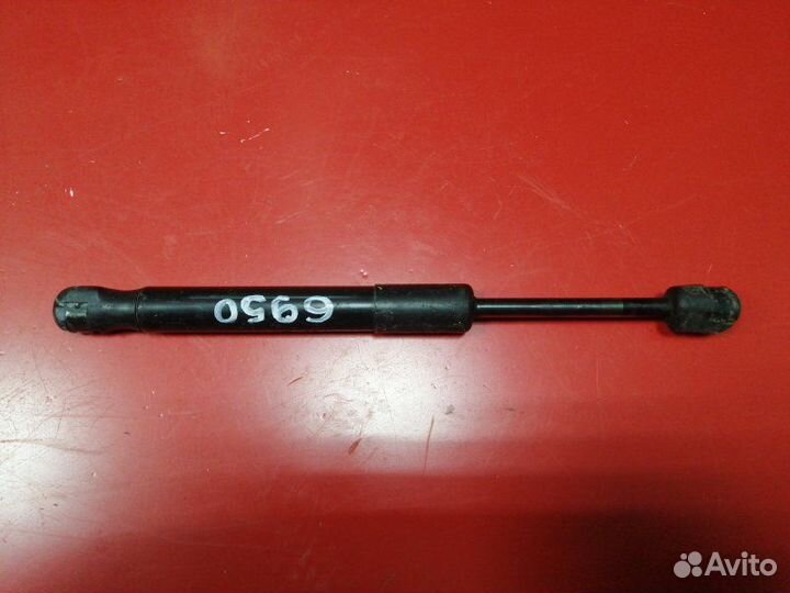 Амортизатор багажника Mazda 3