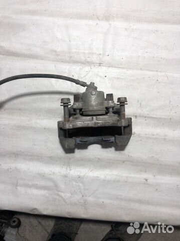 Тормозной супорт левый Фольксваген пассат b6