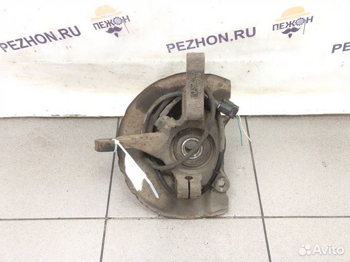 Кулак поворотный передний левый Mitsubishi Lancer