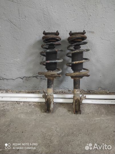 Стойки передние nissan sunny fb15