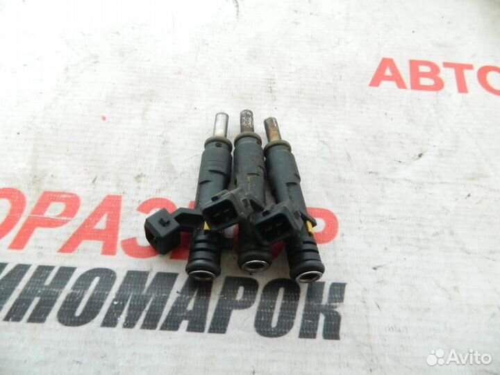 Форсунка инжекторная электрическая для Opel Astra