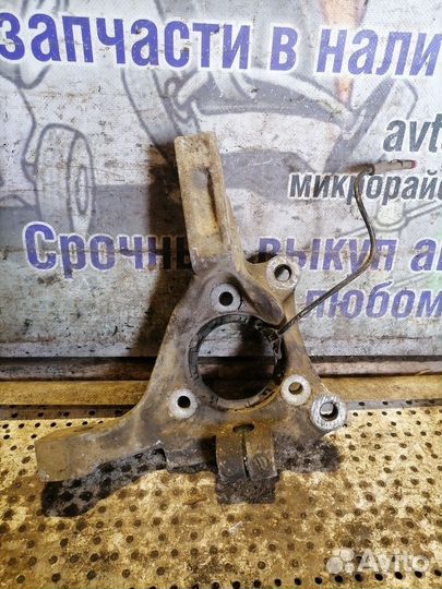 Кулак поворотный передний левый Opel Vectra