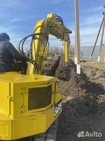 Услуги мини экскаватора. Экскаватор