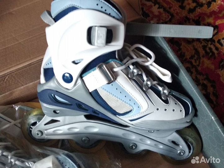Роликовые коньки