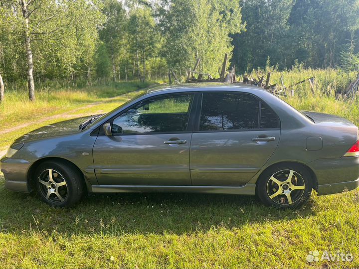 Mitsubishi Lancer 1.6 МТ, 2005, 300 000 км