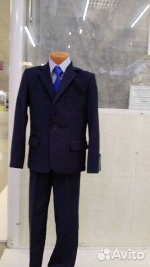 Школьные костюмы для мальчика и для девочек