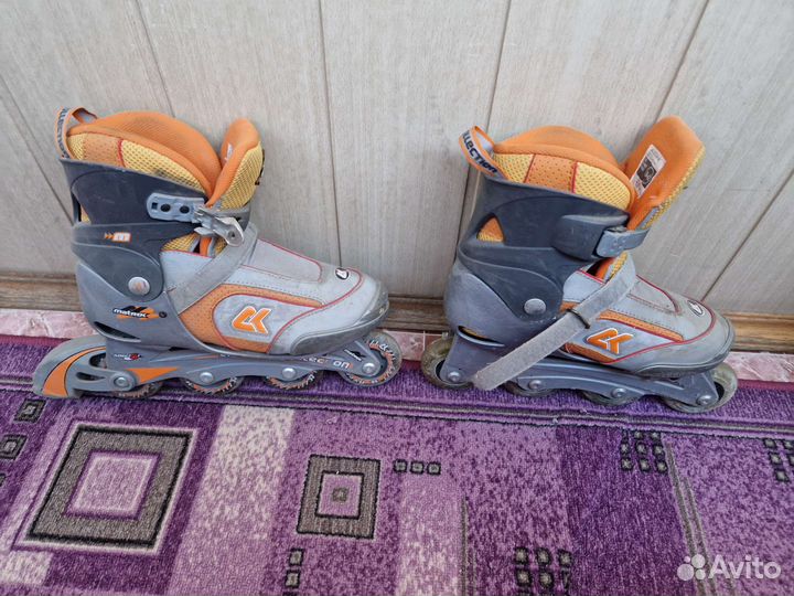 Роликовые коньки