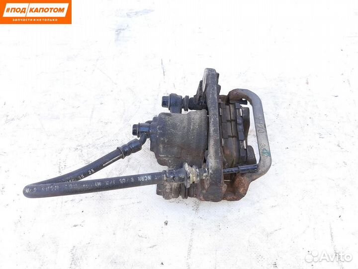 Суппорт тормозной задний правый Nissan Teana J32