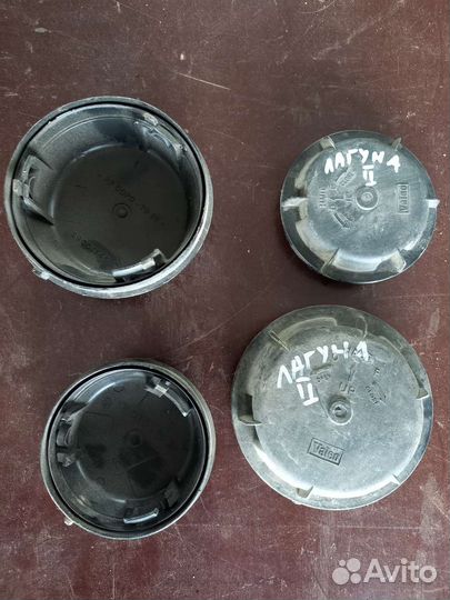 Колпачки на фары. Рено лагуна-2