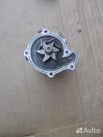 Помпа Nissan Mikra(March) 2002-10г