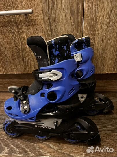 Роликовые коньки