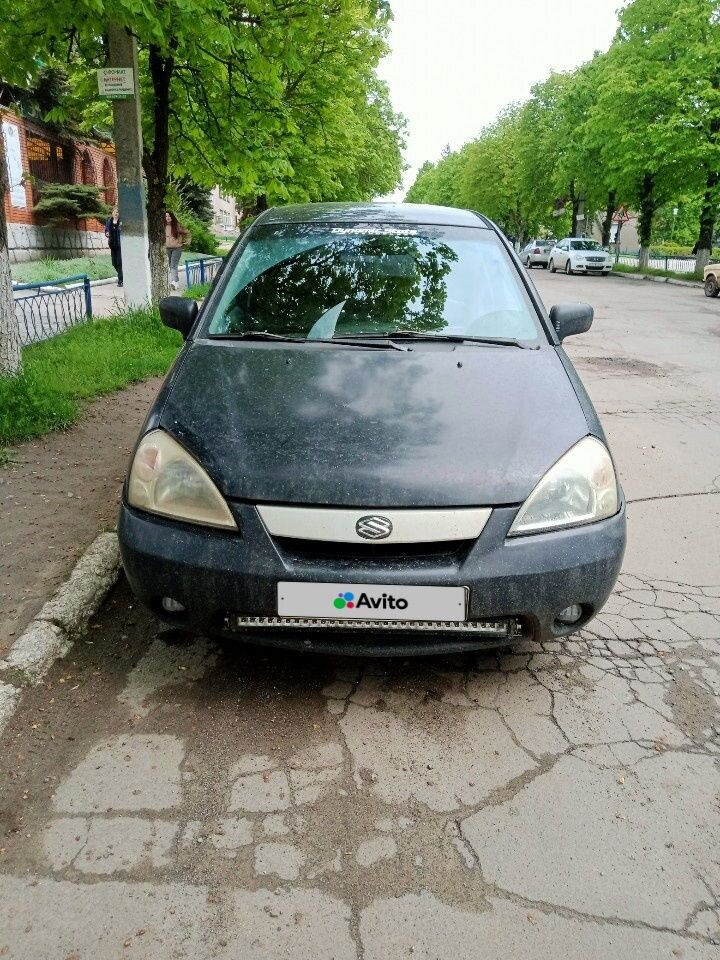 Suzuki Liana: фото владельца