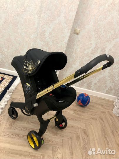 Прогулочная коляска-автокресло Doona + Gold