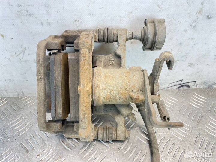 Суппорт тормозной задний левый Chevrolet Cruze