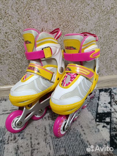 Роликовые коньки