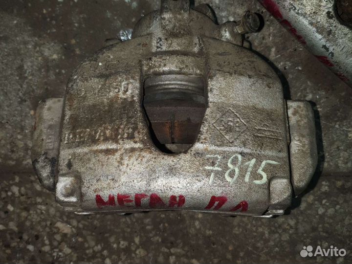 Суппорт тормозной Рено Меган 2 передний левый