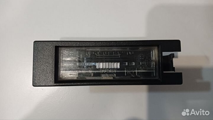 Плафон подсветки номера Opel Astra J