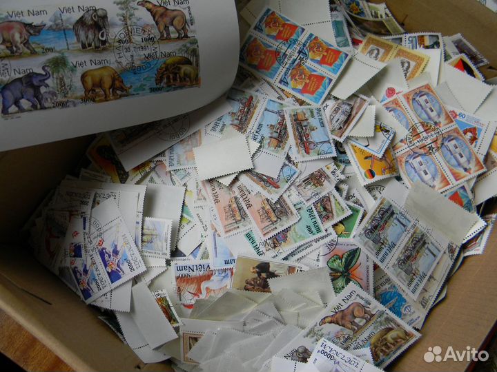 Почтовые марки мира и СССР: более 30 килограммов