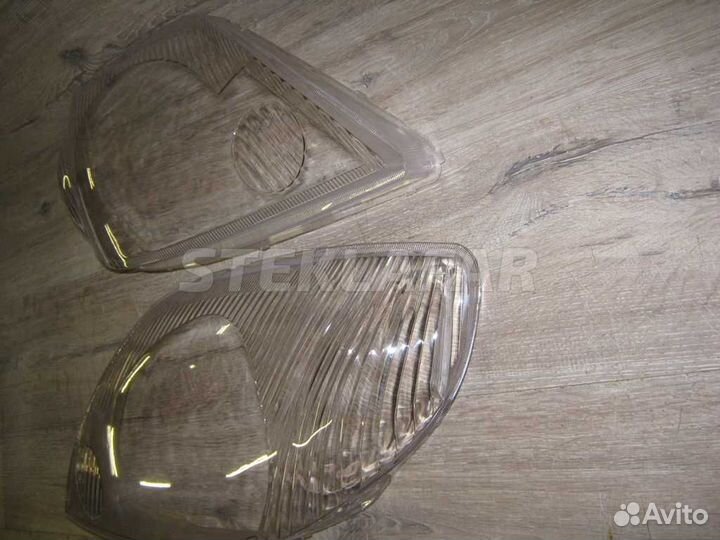 Стекло фары Toyota Corolla E120 (2000-2006) (1 от