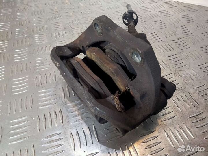 Суппорт передний левый Renault Kangoo