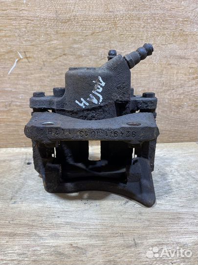 Суппорт передний правый Renault Logan 1 S67