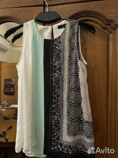 Блуза без рукавов