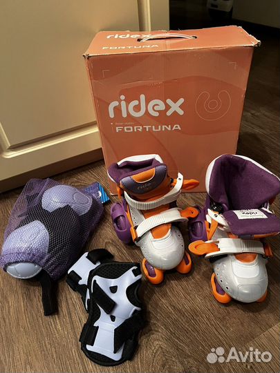 Роликовые коньки