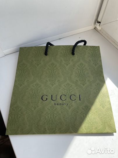 Коробки и пакеты Gucci