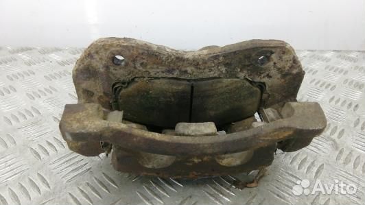 Суппорт тормозной передний левый KIA sorento 1 (93