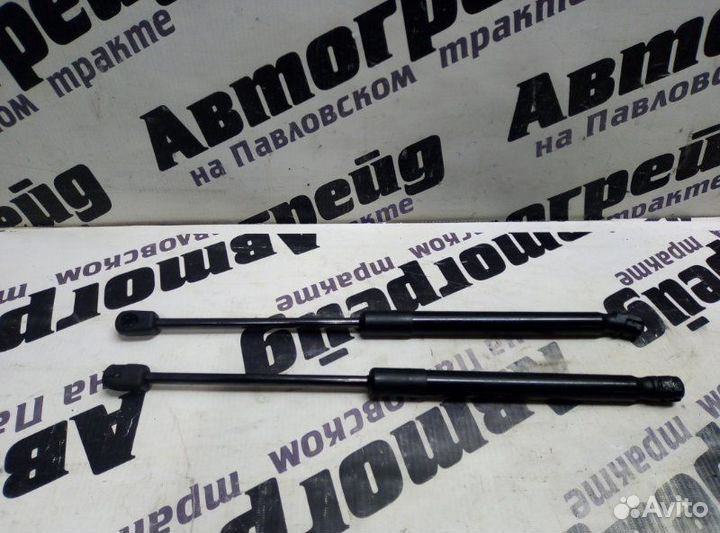 Амортизатор крышки багажника Volkswagen Passat 3C2