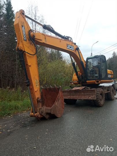 Колёсный экскаватор JCB JS 200W, 2011