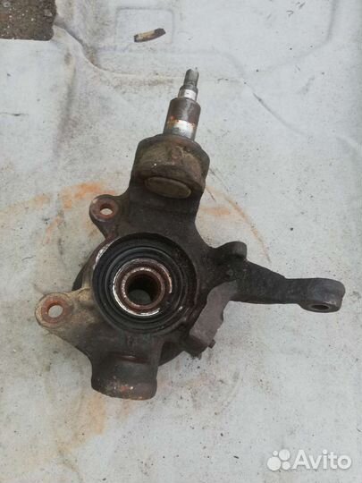 Кулак поворотный передний Ниссан Премьера P11