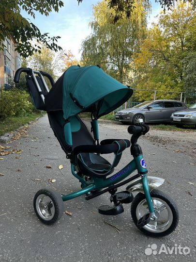 Трехколесный велосипед с ручкой