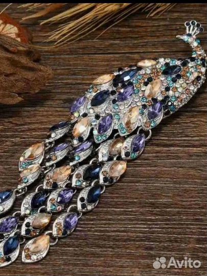 Брошь павлин